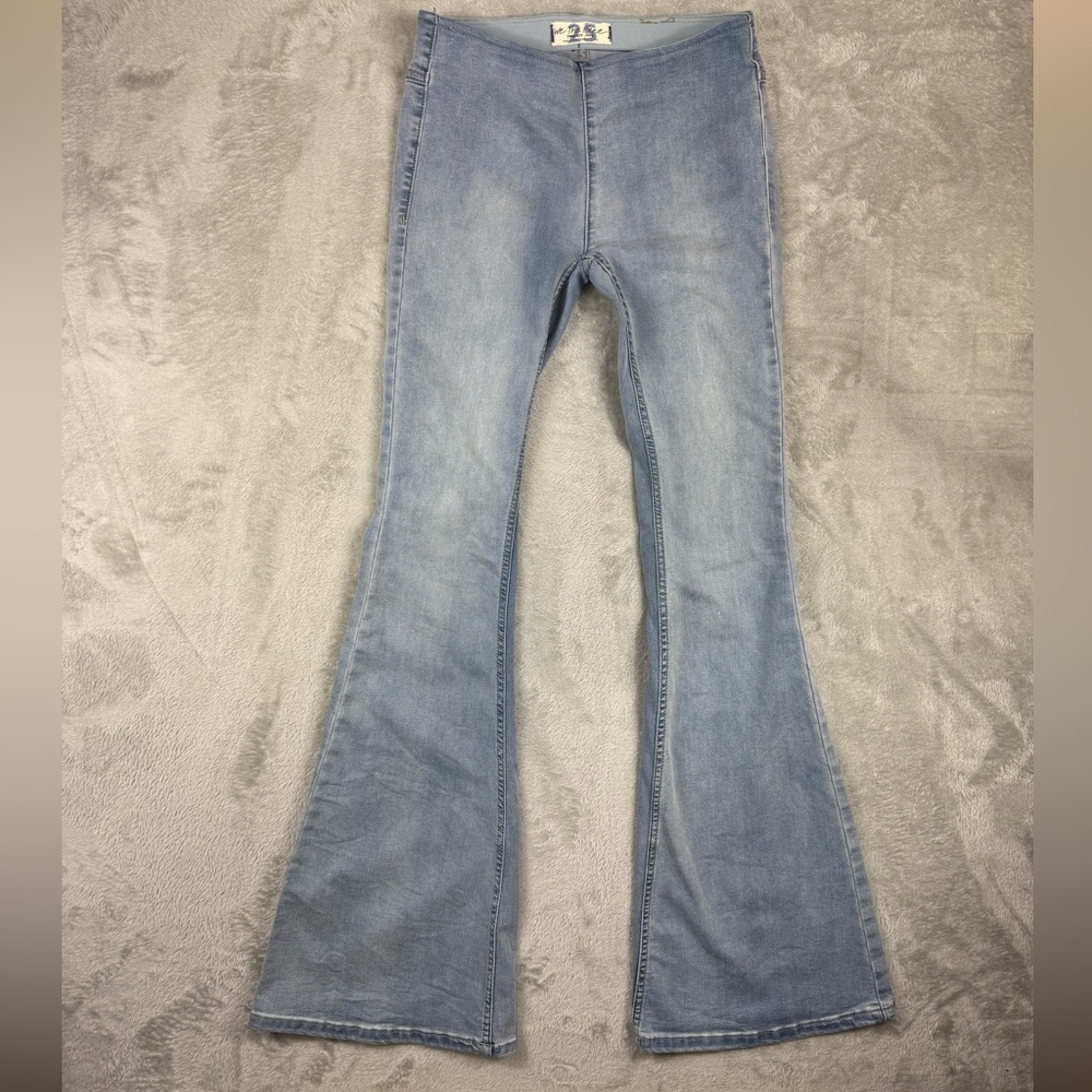 We the free Light blue Wash flare wide leg Women’s Sz 25 Good Condition